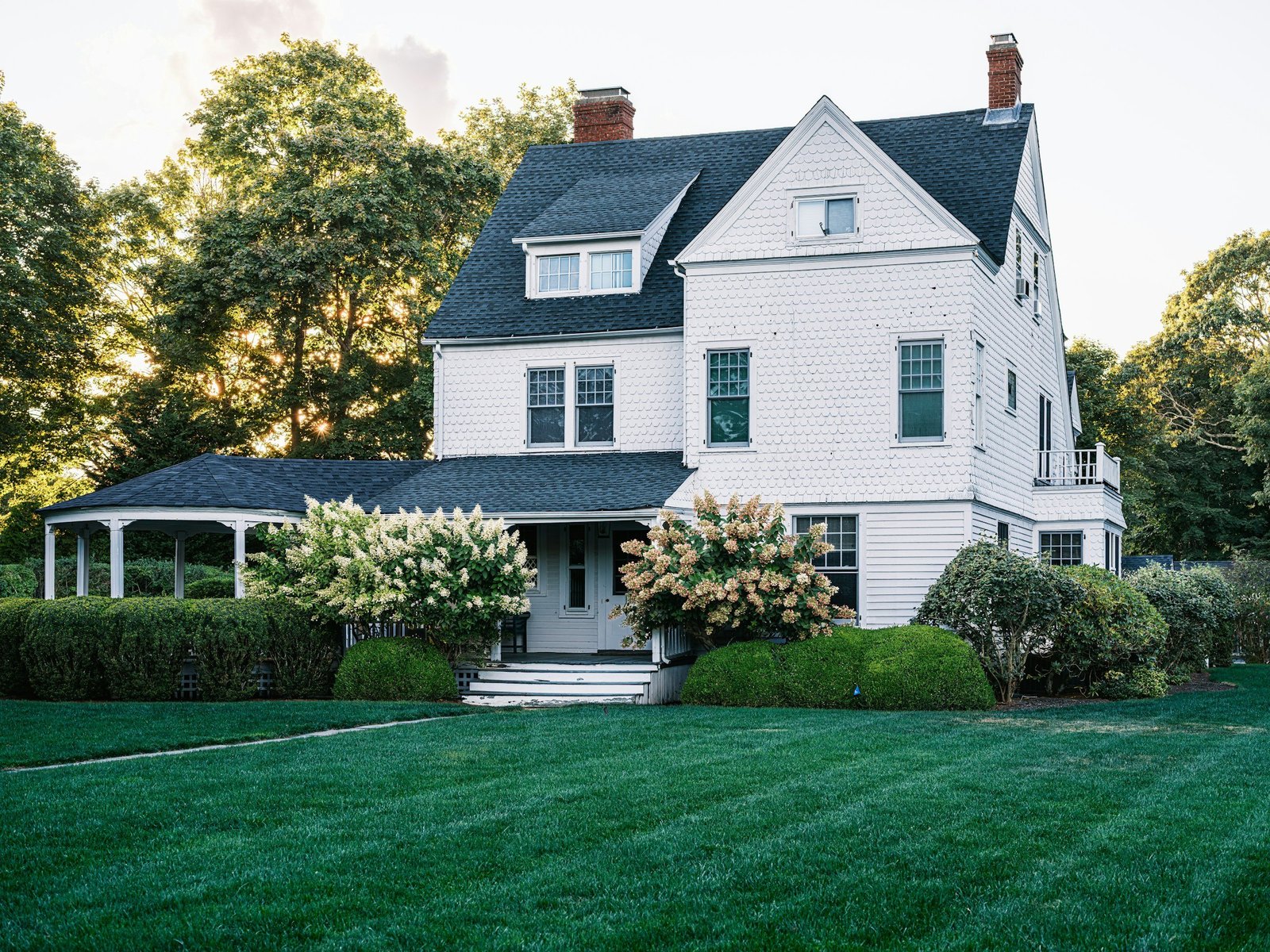 Residential home exterior with siding and a landscaped yard